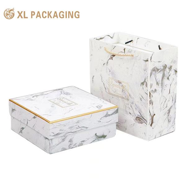 Custom Logo Printing Luxury Design Cardboard Paper Box , Clothes Skincare Festival Gift Packaging Box With Ribbon Bow