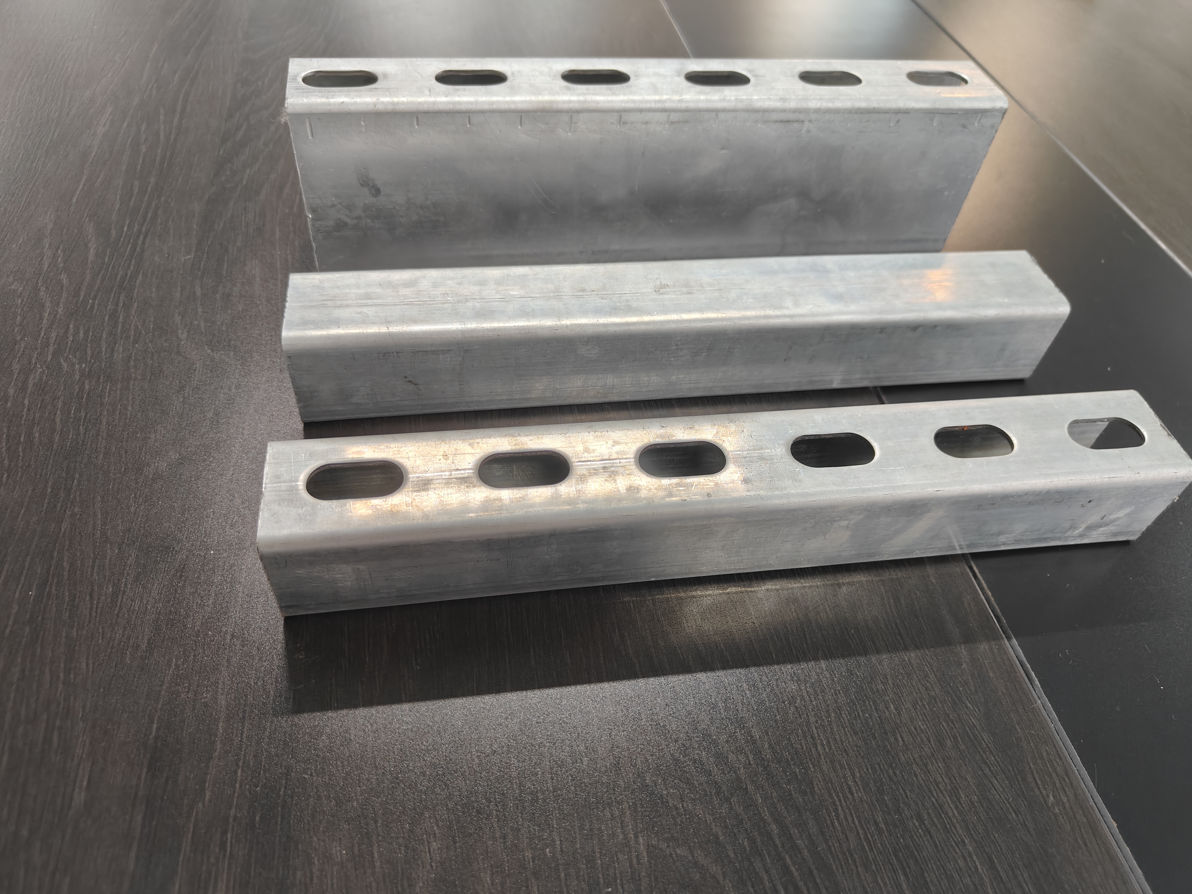 Unistrut Channels Pre Galvanized Slotted C Strut Channel Made from Carbon Steel with Oval Holes for Flexible and Quick Assembly