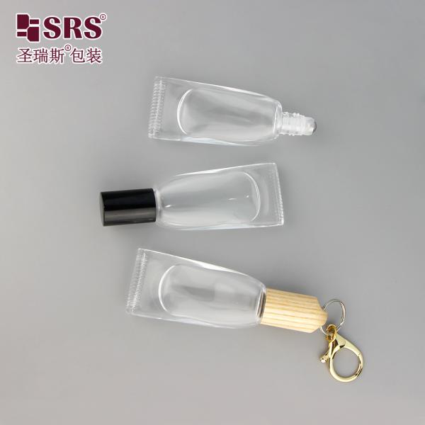 Wholesale Light Resistant Brown Gradient Coating Colored Glass Vial Container With Stone Roller Ball For Perfume With Keychain 10ml