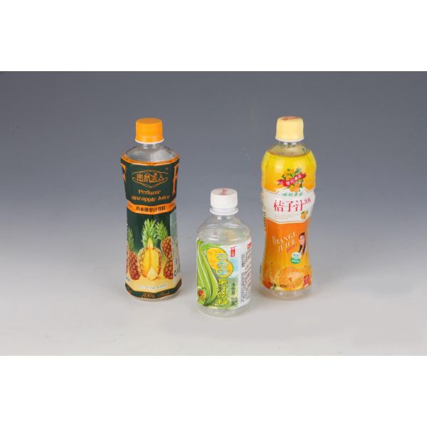 Etiquetas personalizadas da luva de psiquiatra de calor do PVC do projeto para o empacotamento da garrafa de água do suco