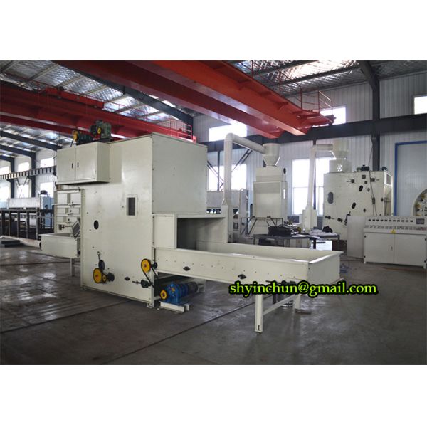 NON-WOVEN BALE OPENER