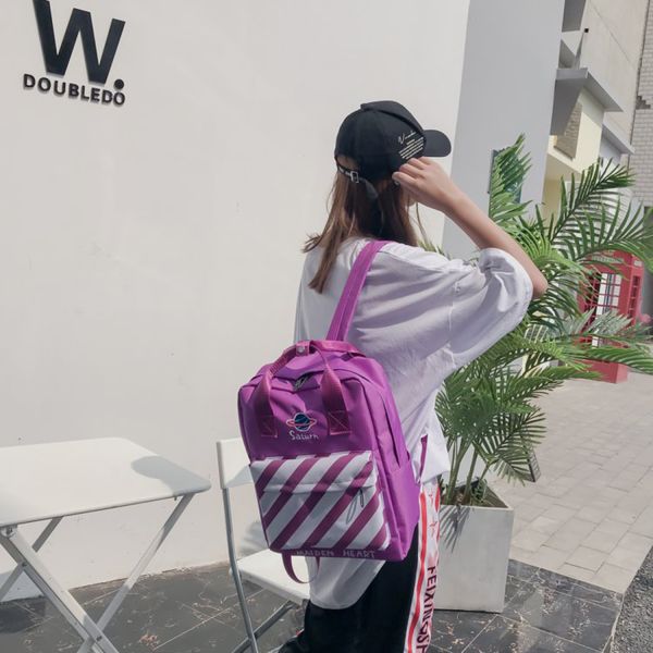 Korean embroidery star stripes handheld backpack personality of students schoolbag