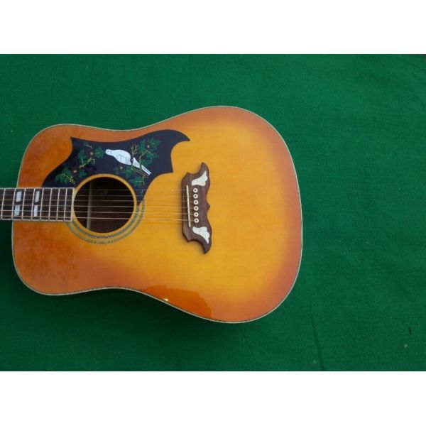 2018 Orange Sunburst Dovo acoustic guitar