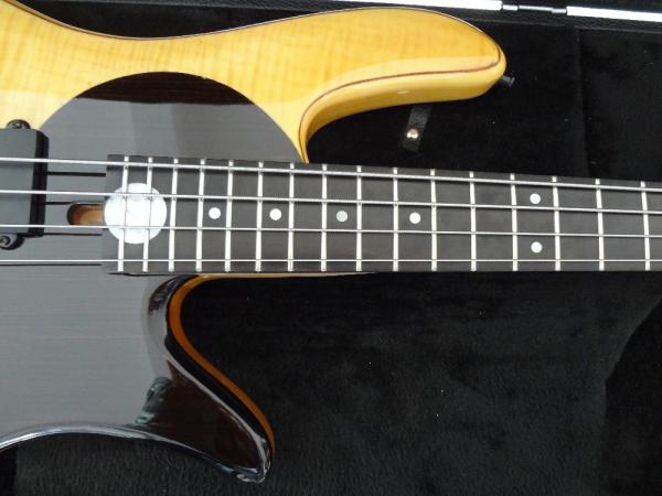 4 string bass guitar Fodera custom bass guitar Alder with flamed maple top Taiji design body MOP inlay logo