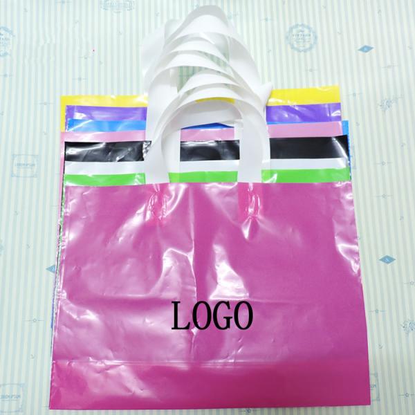 O grande tamanho de primeira qualidade colorido do saco de compras plástico descartável Waterproof os sacos dos punhos convenientes levar
