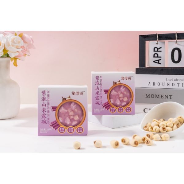 Vegan cereals bowl with yam Tazón de postre digestivo de camote morado con granos integrales y hierbas tradicionales chinas – A base de plantas y listo para comer