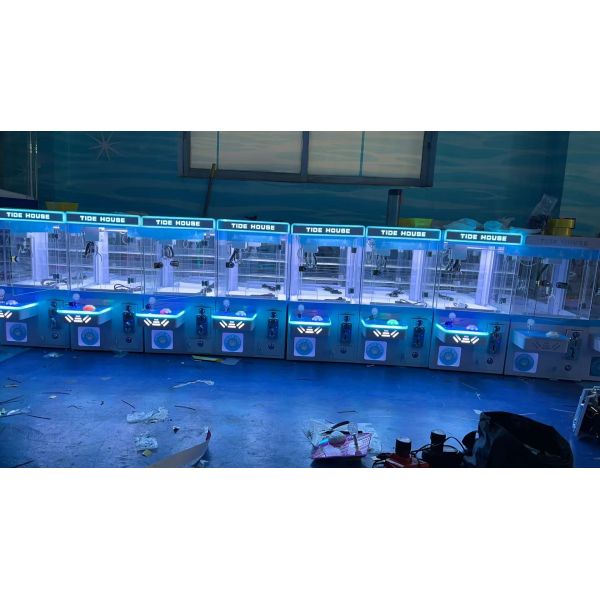 Dreamland Venta caliente de monedas Mini TIDE operado máquina de grúa de la casa MINI máquina de juego de garra