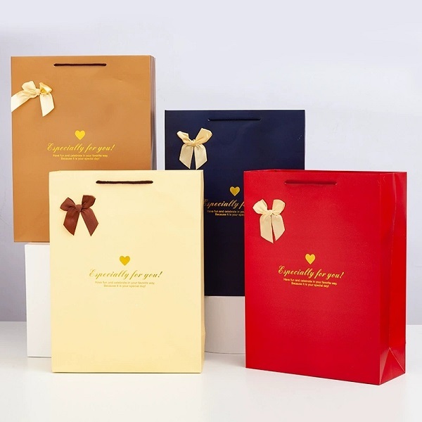 Paper Gift Shopping Bags with Satin Ribbon Bow Knot Handles for Luxury Retail