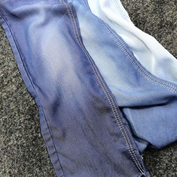 Ligero 4.5 oz Lyocell puro Tejido de denim para marcas de lujo JSD2028