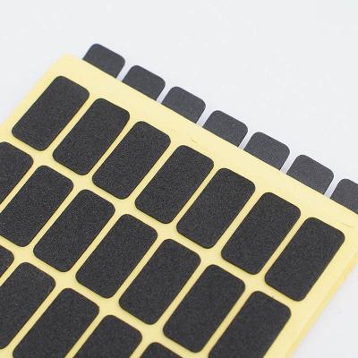 Almofadas do pé do preto da absorção de choque do deslizamento da gaxeta autoadesiva feita sob encomenda da borracha de silicone anti