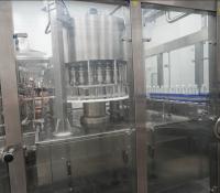 高速52,000BPH ISO認証充填ライン：最新のボトリングプラント向け精密性と効率性