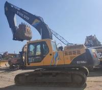 Excavateur Vollvo EC210BLC jaune d'occasion en bon état à vendre