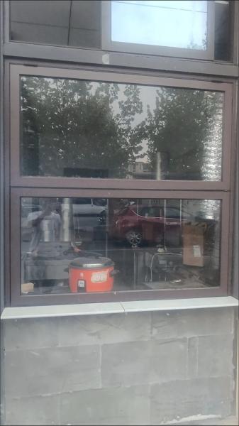 View Vineyard Folding Window Showcasing Grape Harvest Activities from Living Rooms