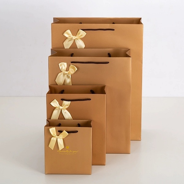 Paper Gift Shopping Bags with Satin Ribbon Bow Knot Handles for Luxury Retail