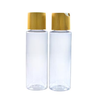 Hot selling natural clear PET plastic lotion pump bottle with bamboo cap  200ml