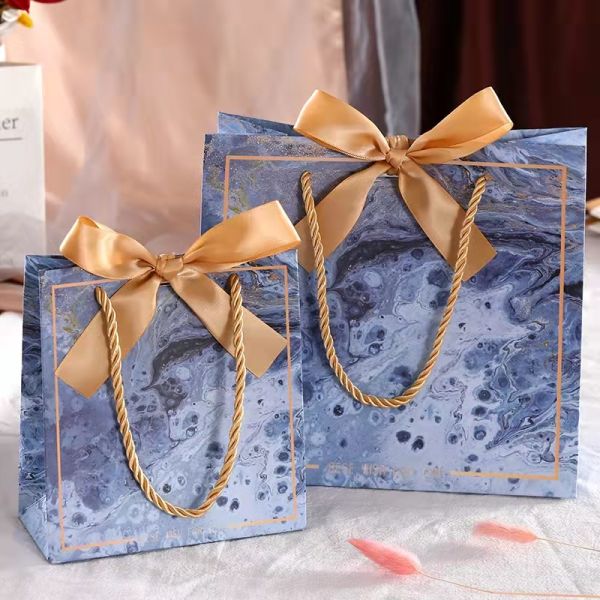 оптовый роскошный складной торговый пакет с настраиваемым логотипом черный бумажный подарочный пакет с лентой