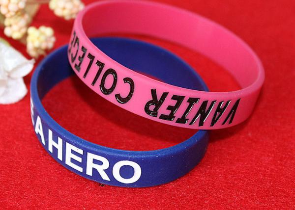 Lettering Debossed Silicone Wristbands , Rubber Promotional Bracelets Smooth Edge