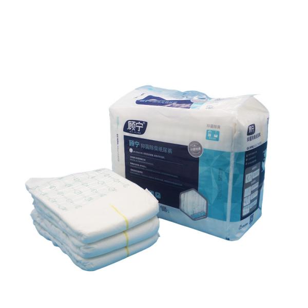 Couches pour adultes jetables, couche super absorbante et ADL, surface douce et sèche, protection contre les fuites, indicateur d'humidité, ruban adhésif