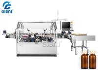 Machine à étiquettes rotatoire de double tête automatique pour la bouteille ronde en verre