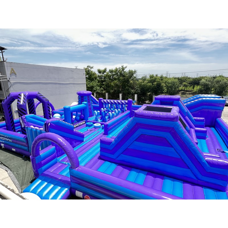 Purple Inflatable Ninja Obstacle Course with Climbing Challenges Balance Steps and Multiple Activity Zones
