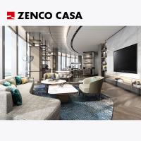 El conjunto de muebles del salón ejecutivo del hotel incluye un sofá de tela y una mesa de café.