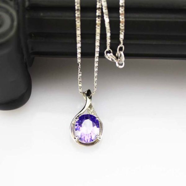 Sterling Silver 9mmX11mm Oval Purple Cubic Zirocnia Pendant (P33E)