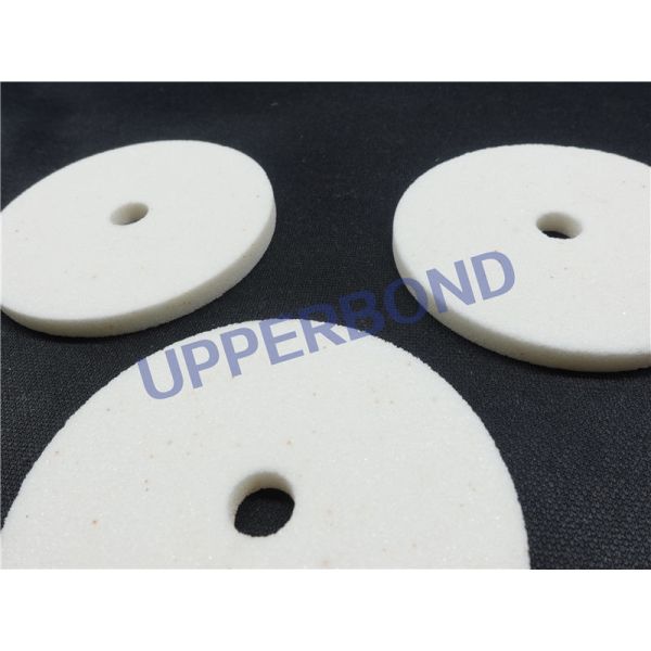 Roda de moedura redonda das facas que aponta a pedra da moagem para o cigarro que faz a máquina