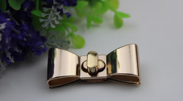 Hanging plating zinc alloy fashion gold metal bow-knot pattern small purse turn locks