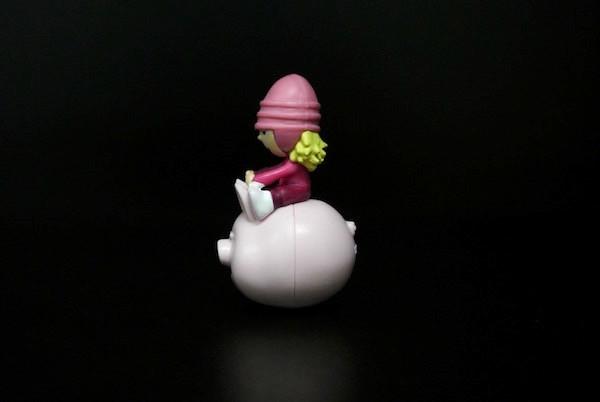 One Inch Height Plastic Toy Figures A Girl With Pinky Hat On A Pig As Tumbler