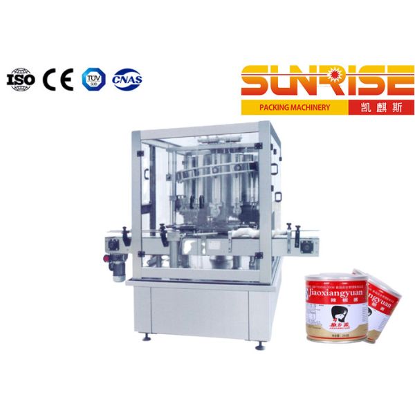 La sauce chaude à ketchup met en boîte la tête remplissante de machine de