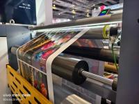 Rouleaux d'encre séparés des rouleaux d'impression sur une machine à imprimer à manches flexibles