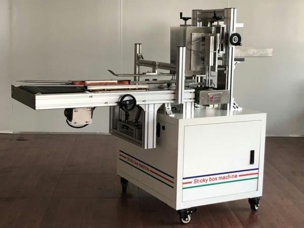 Cheap price semi automatic facial tissue paper carton box sealing machine