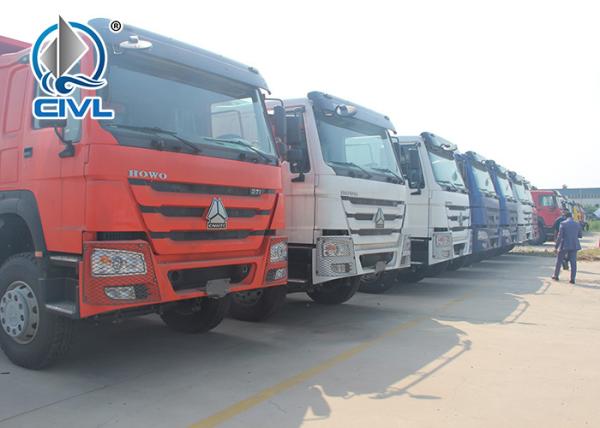 10 Tires howo New Heavy Duty Dump Truck 336hp 6x4 Rhd 30 Ton White / Red / Green color