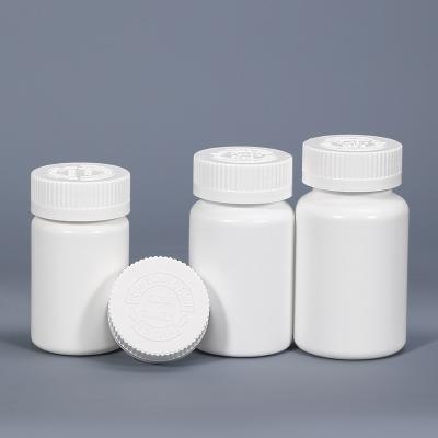 Garrafas de pílulas de plástico redondo branco para comprimidos à prova de crianças