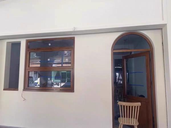 Aluminium Hurricane-Proof Vertical Bifold up Windows Plastic Steel Vertical Folding Design Push-Up Feature Aluminum
