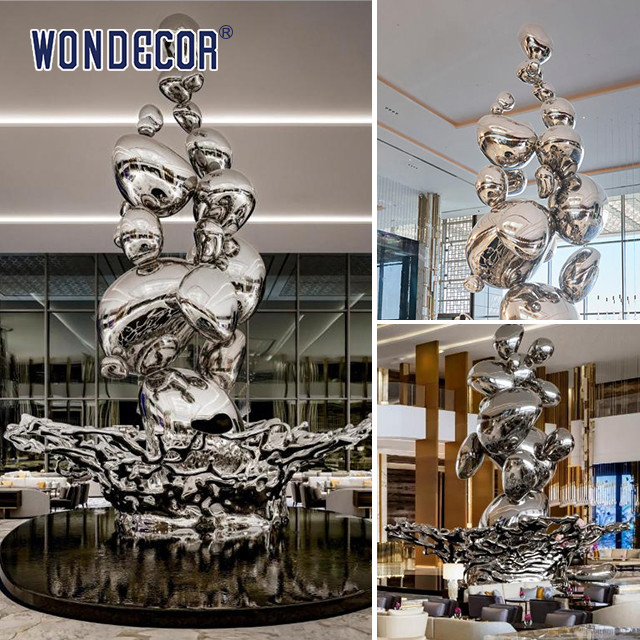 Большая кованая металлическая скульптура Капли воды и брызги в гостиничном фойе