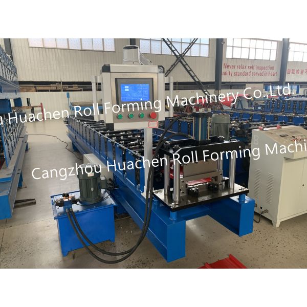 A tile-making machine / roof panel forming machine that uses metal coil rolling process