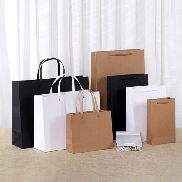 Bolsas de almacenamiento para el hogar Bolsa de papel kraft con logotipo personalizado con manija desechable