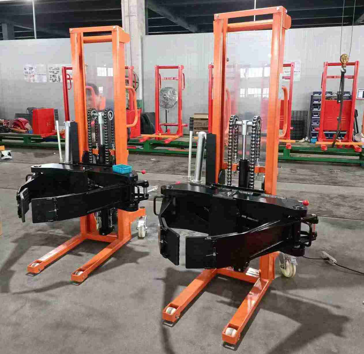 CE Certificated 250kg 300kg 500kg 1.6meters Manual Roll Stacker With Clamp And Rotator