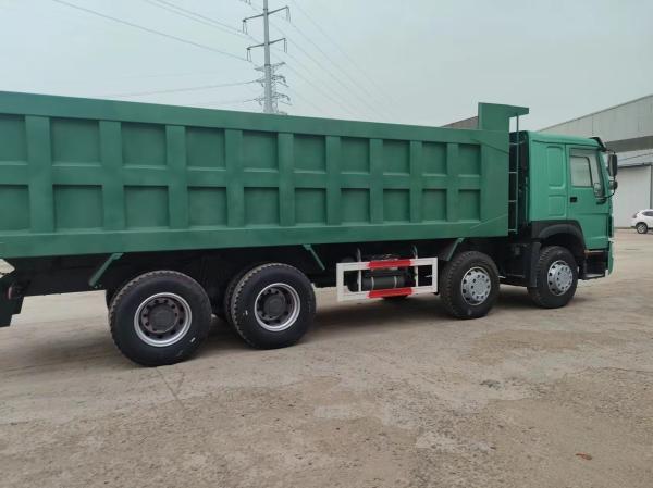 Estilo de elevação frontal 375HP Sinotruk HOWO 8*4 camião de descarga camião de segunda mão para descarga