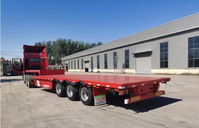 Truck Trailer Flatbed Semi Trailer With 30-60 Tons Loading Capacity And 1 Tool Box Big Chamber
