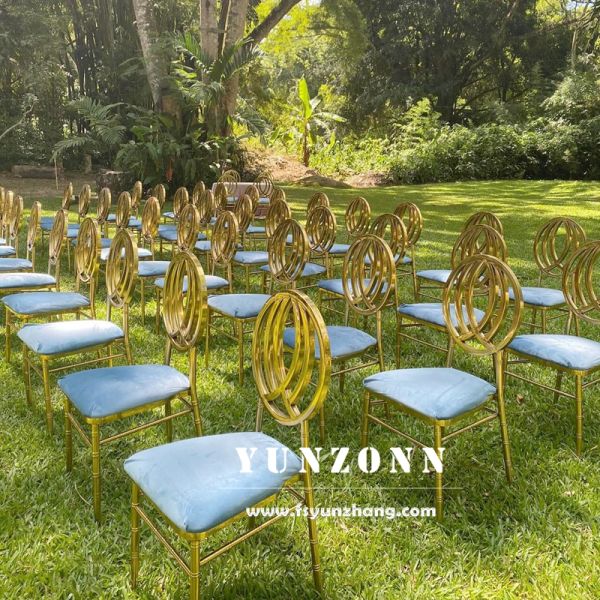 China Factory Supply Stainless Steel Phoenix Chair in Gold and White for Weddings Banquets Hotels Outdoor Dining Apartments