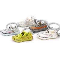 Calzado deportivo personalizado en forma 3D Mini Sneaker Promocional Concha de llave a granel
