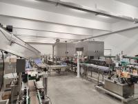 Linha de produção totalmente automática de embalagem em cartão e paletização