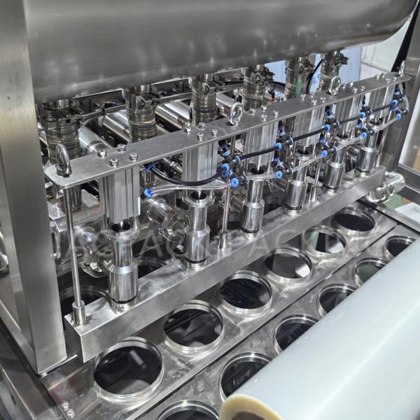 Economical Cup Filling And Sealing Machine Capable Of Packaging Liquid And Semi Liquid Items