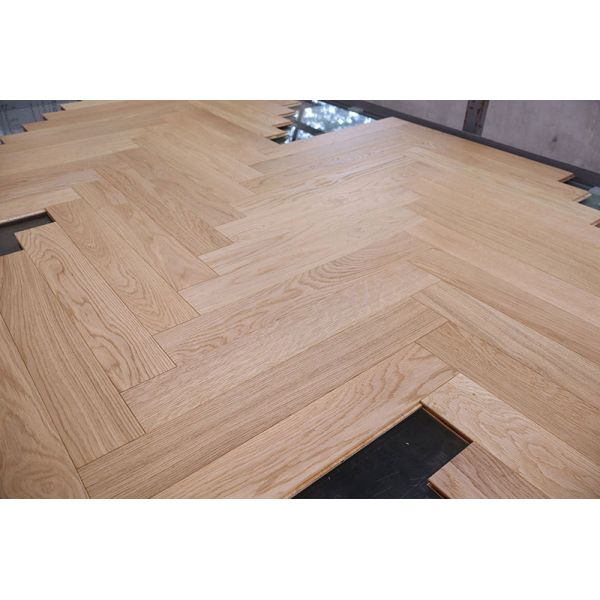 White Oak Herringbone Parquet Flooring with Matt 5-10% Finish and 25 Years Residential Warranty