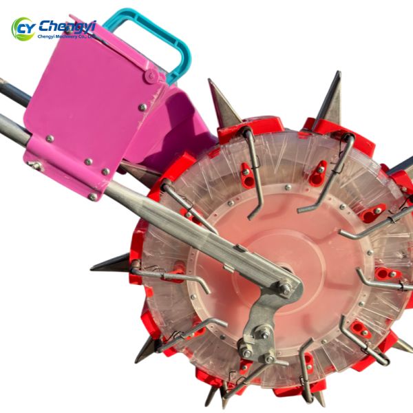 Heavy Duty Iron Hand Push Seeder Rust Resistant Coating For 4Kg Seed Capacity