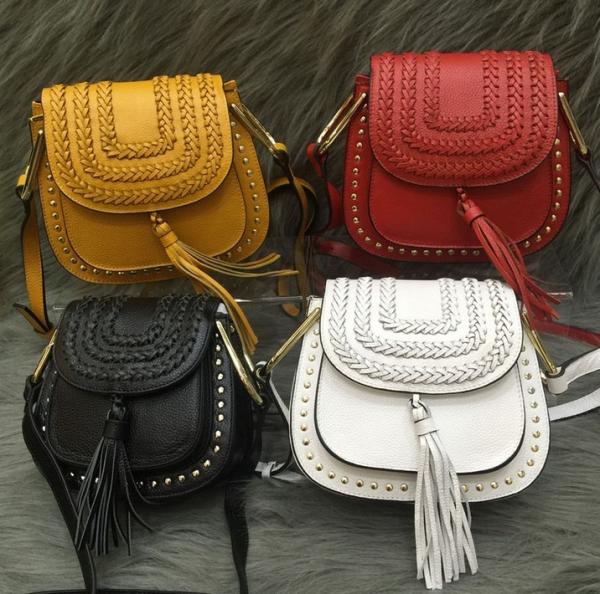 Female head layer of leather 2016 new European and American fashion rivet fringed shoulder bag Messenger packet