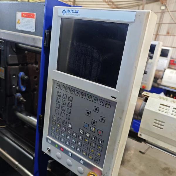 Máquina de moldeo por inyección de servomotor MA1200IIS/400 usada 1200KN con volumen de inyección PS de 214cm3