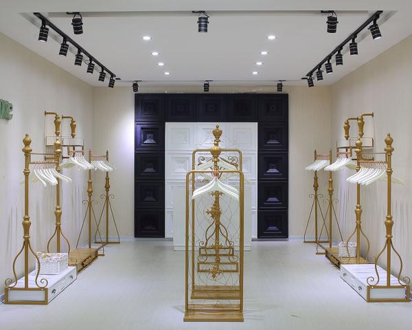 Women Clothing Store Shelves / Retail Clothing Display Systems Golden Color